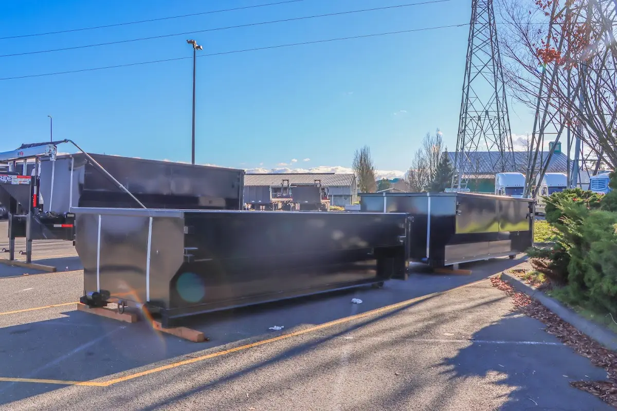 Roll-off dumpster ready for waste disposal at job site for Yard Waste Dumpster Rental in Springfield